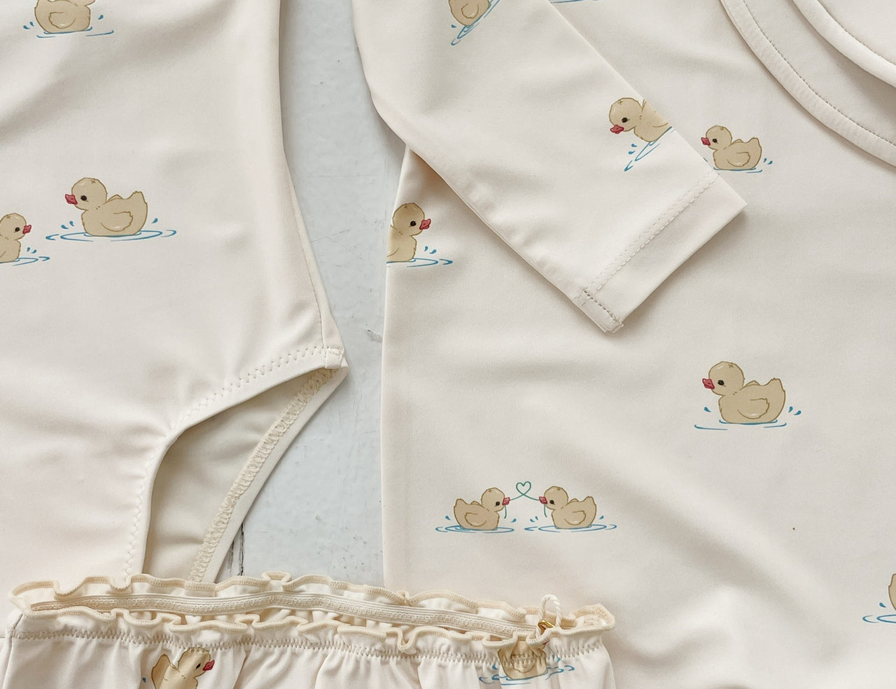 Konges Sløjd A/S UV ONESIES fanga mio